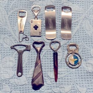 8 vintage bottle openers